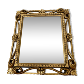 Miroir à poser au cadre en bois doré ajouré
