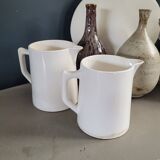 Pair of Digoin porcelain pitchers