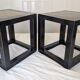 Chinese side tables in black lacquer, stone top.