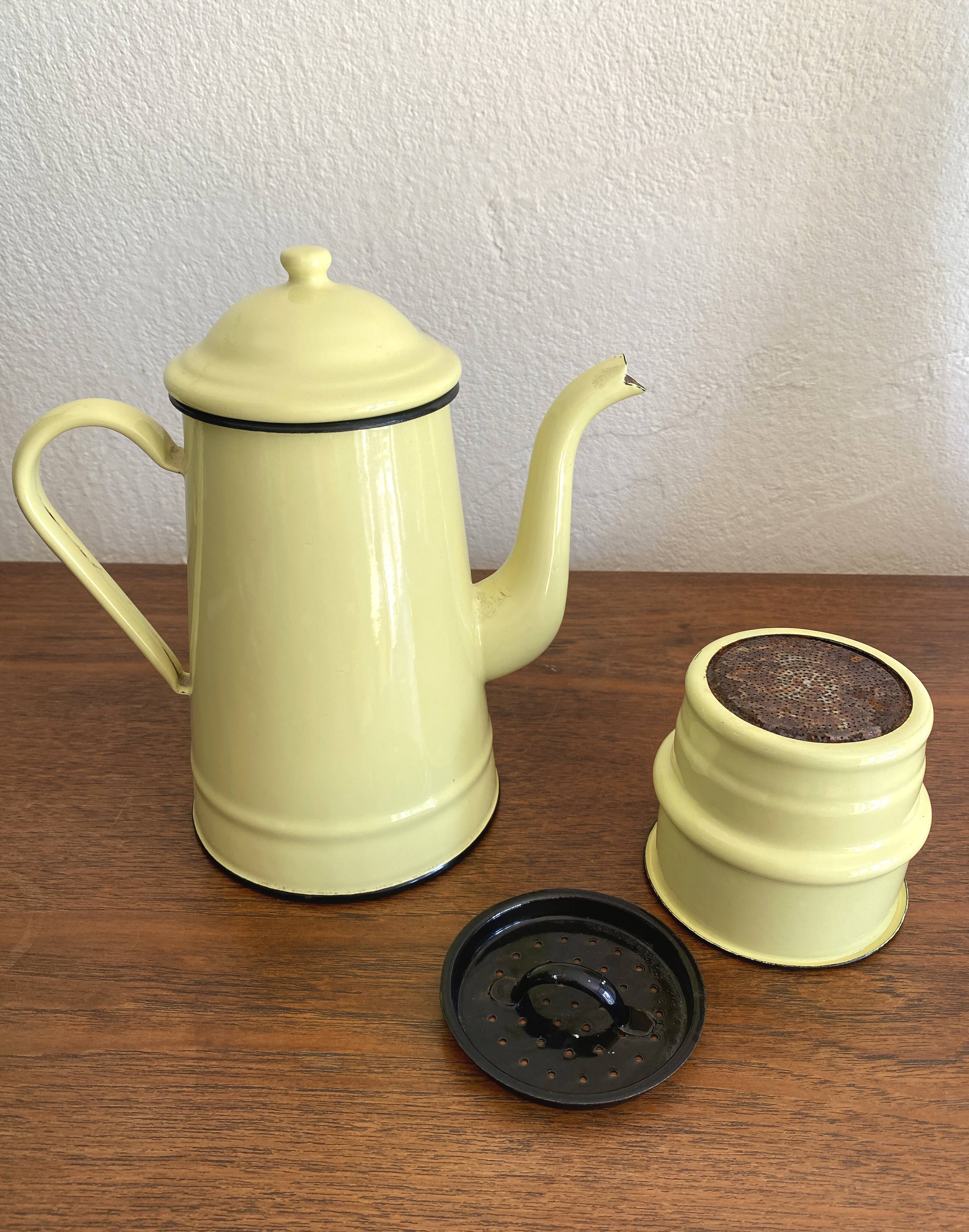 Large vintage coffee pot in pale yellow enamel.