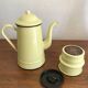 Large vintage coffee pot in pale yellow enamel.
