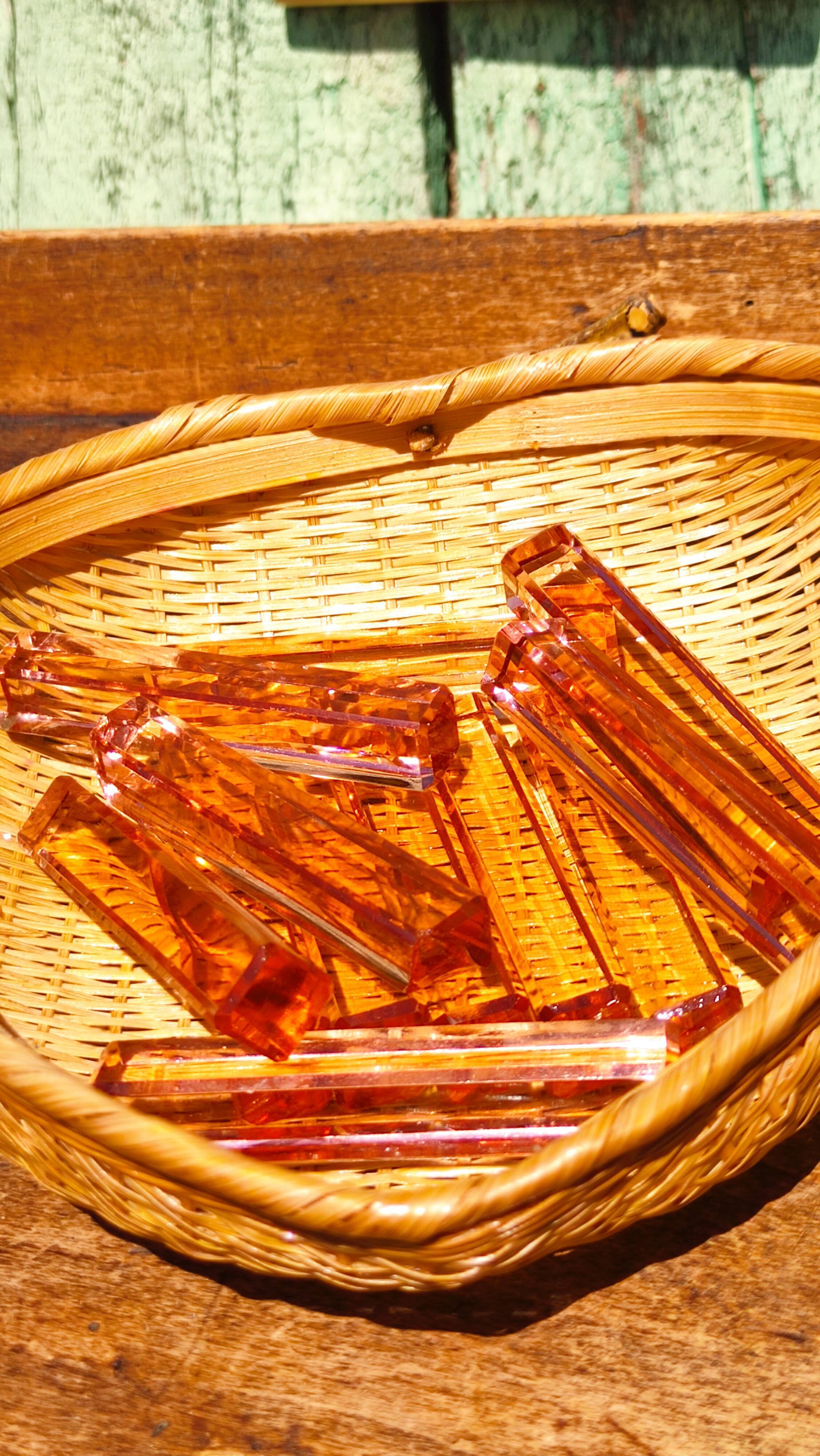 Ten pink glass knife holders