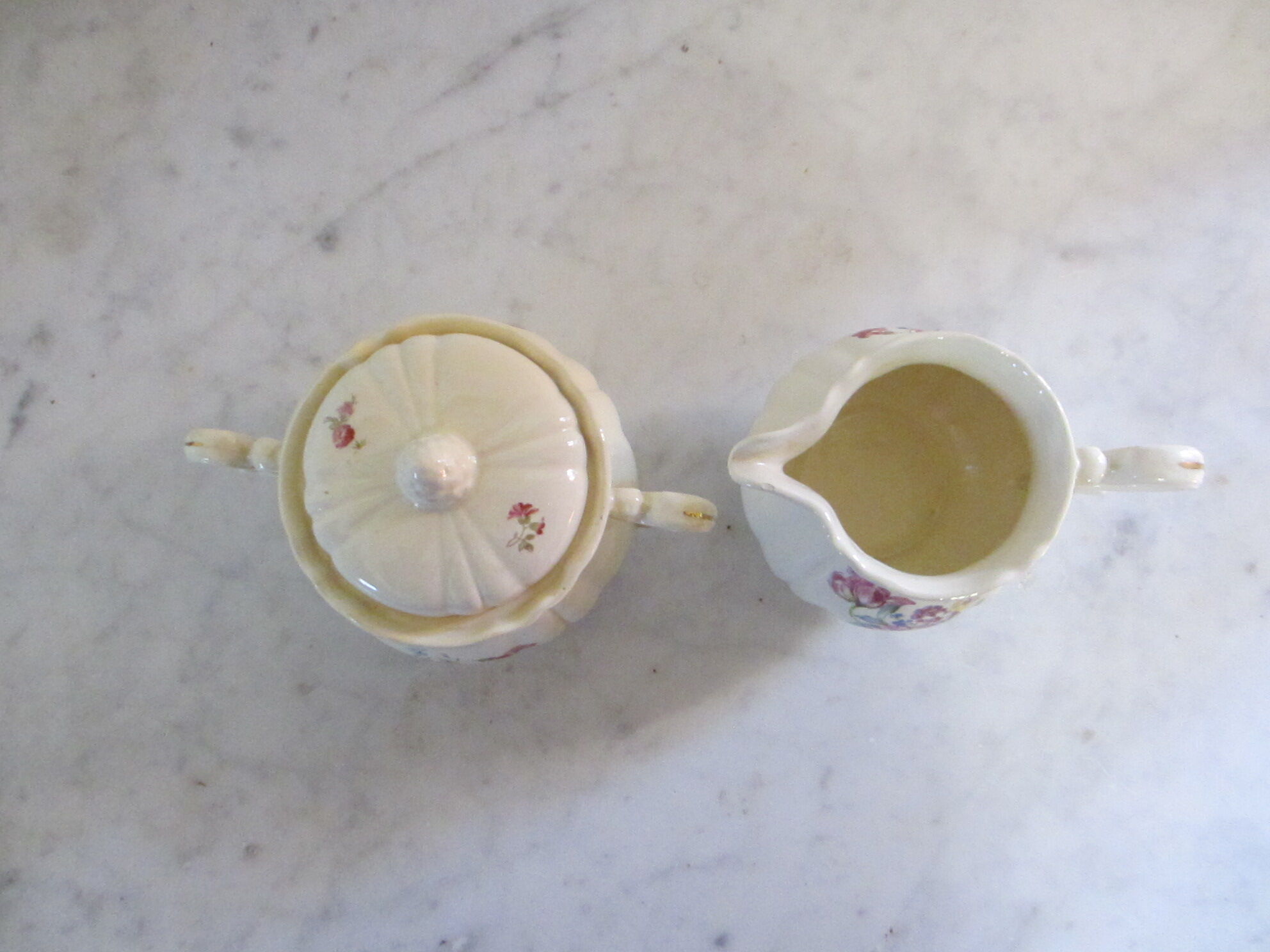 Milk pot and sugar in Digoin earthenware.