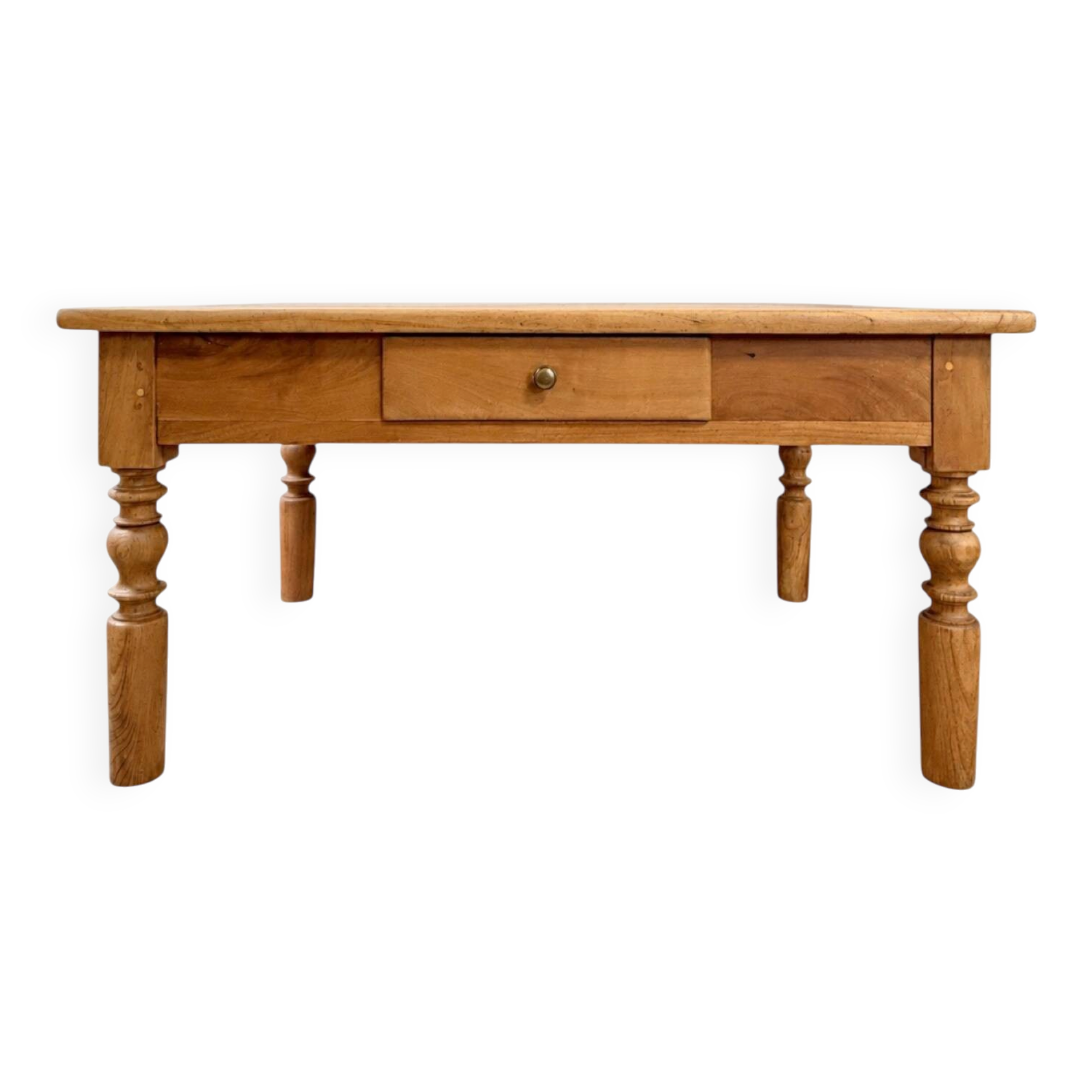Antique coffee table in solid elm with turned legs.
