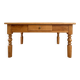 Antique coffee table in solid elm with turned legs.
