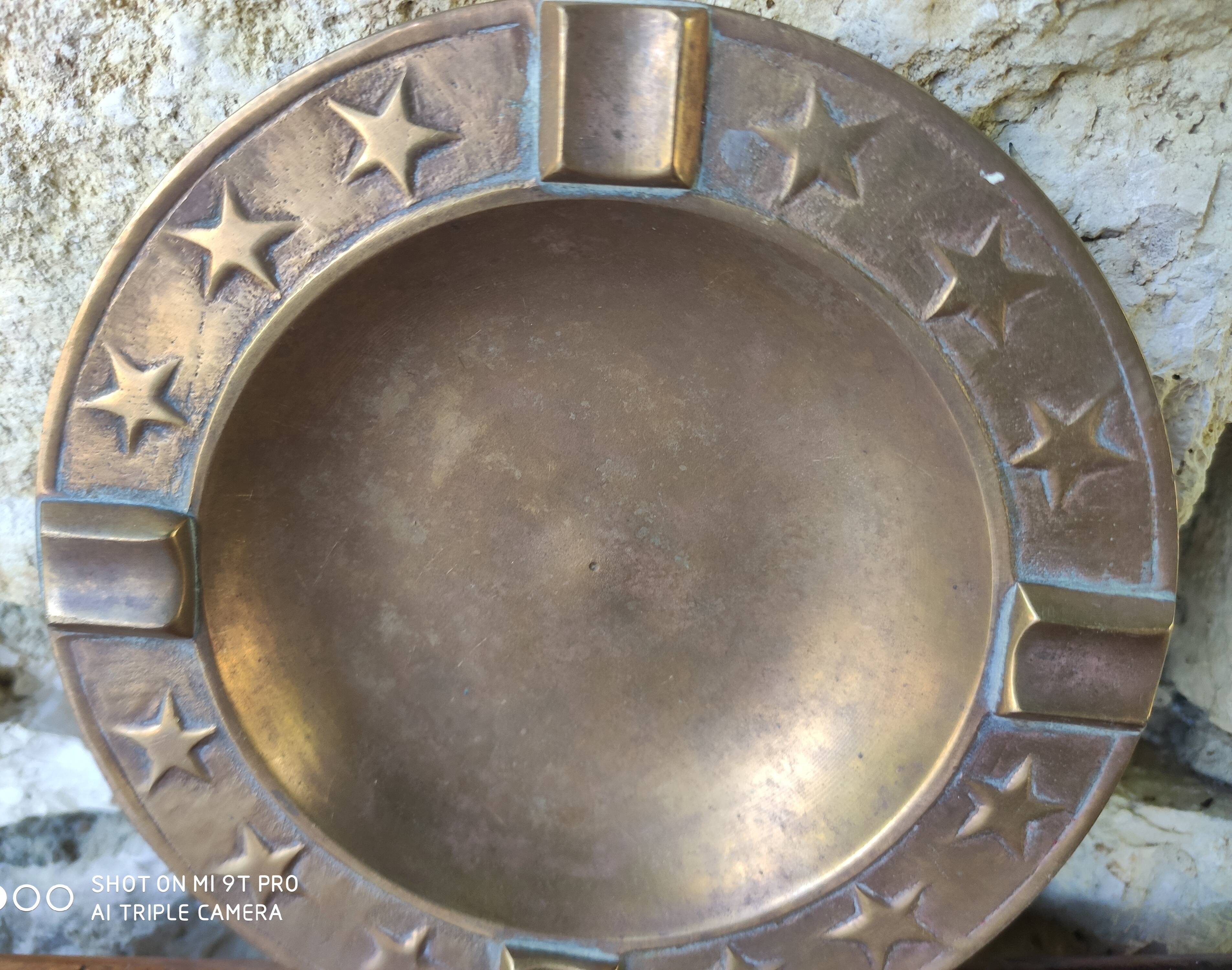 Brass ashtray with stars