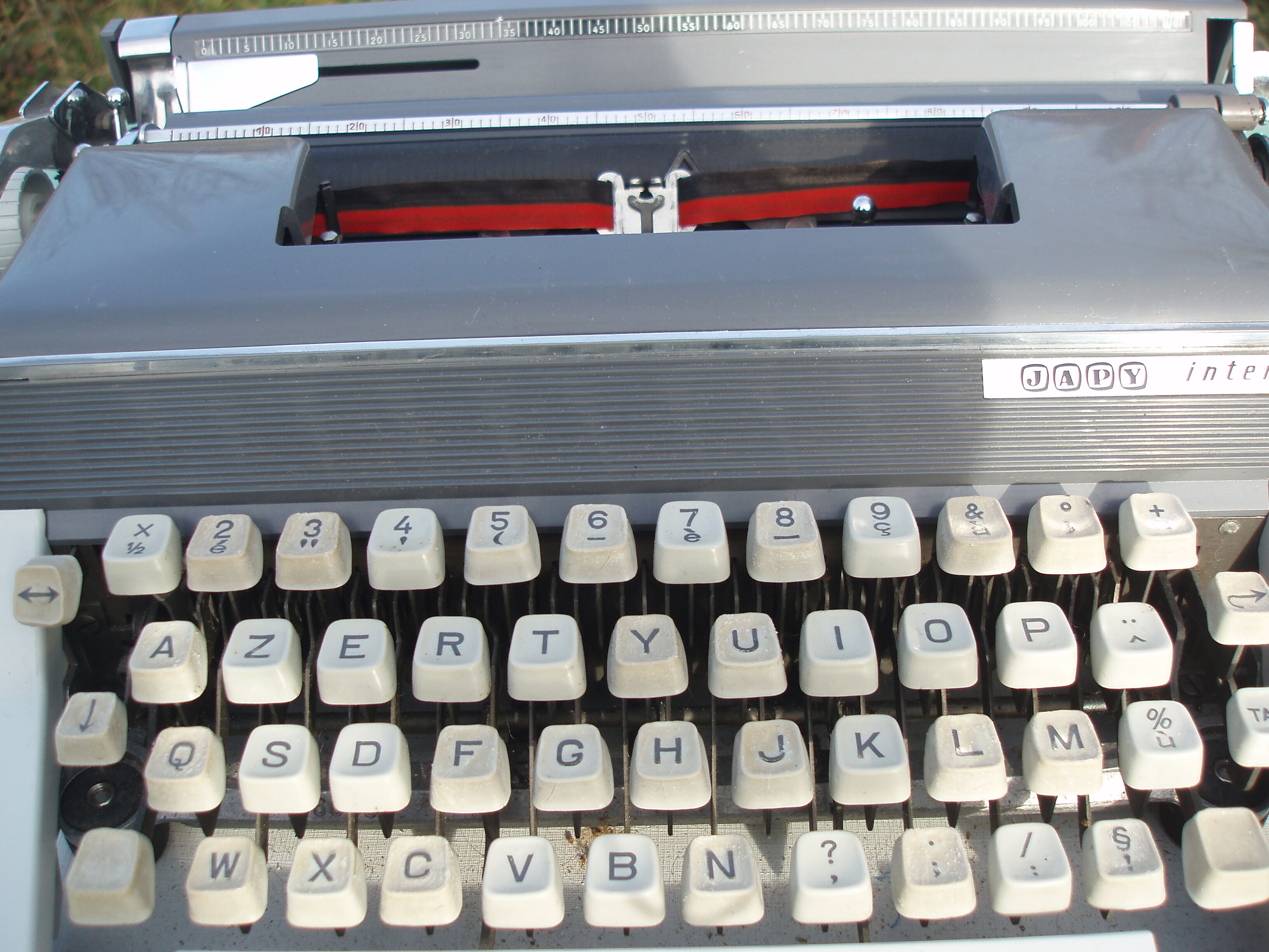 Typewriter in very good condition revised japy inter with his satchel