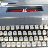 Typewriter in very good condition revised japy inter with his satchel