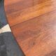 Baumann round oval extendable Scandinavian table in rosewood with 2 extensions.