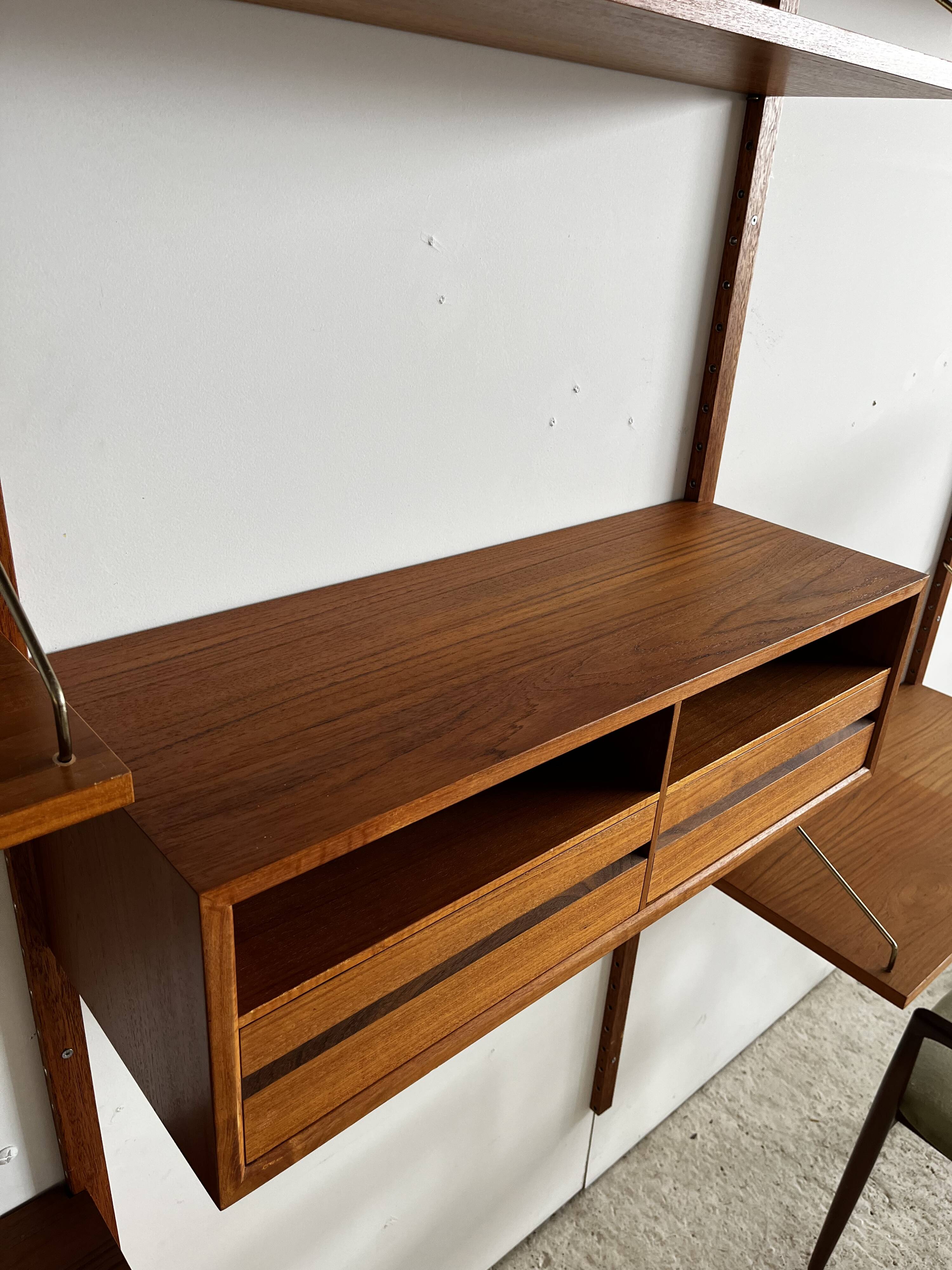 A wall unit with 4 compartments by Poul Cadovius, Denmark, 1960s.