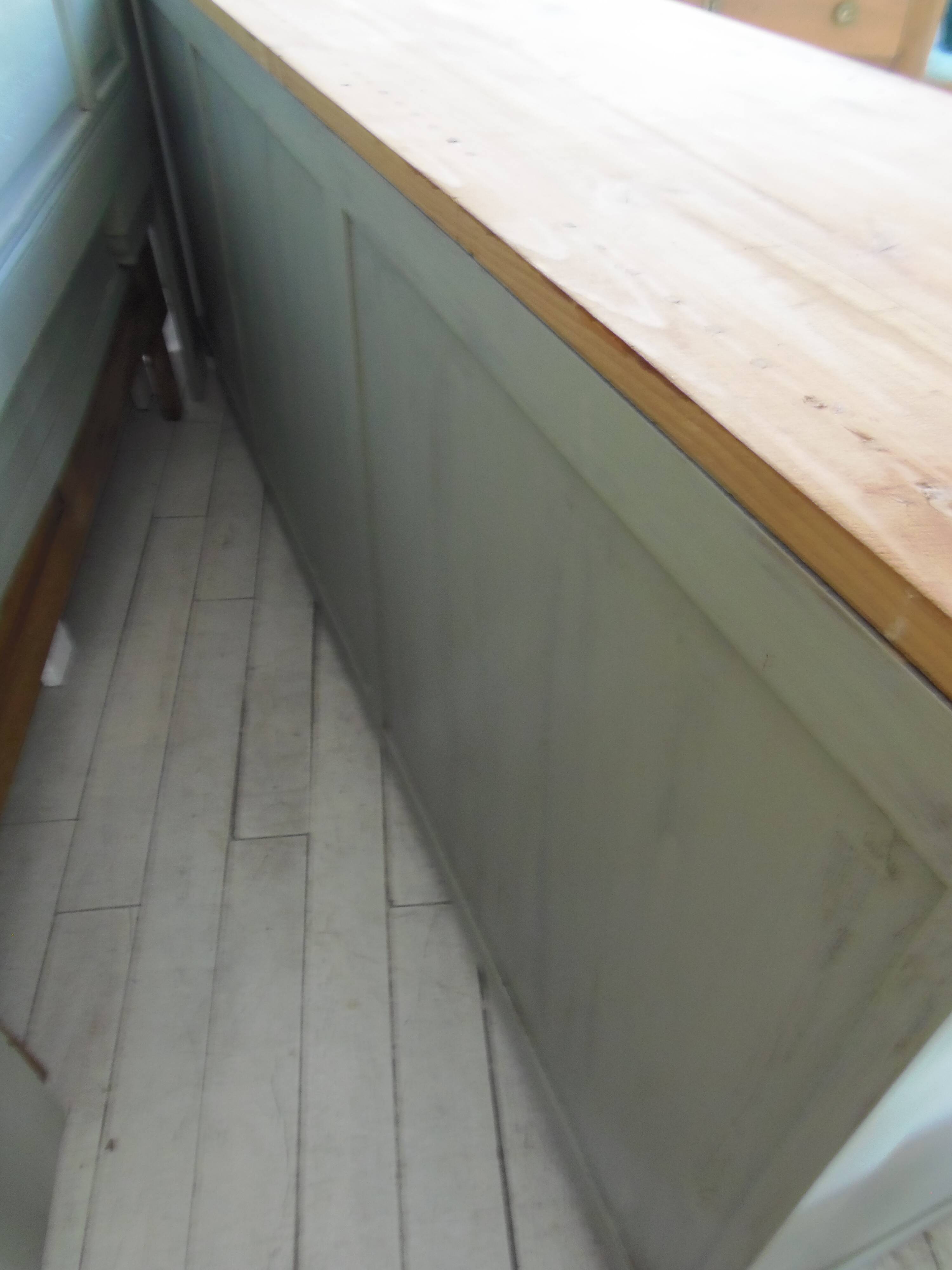 Professional furniture enhanced in verdigris, wooden top.