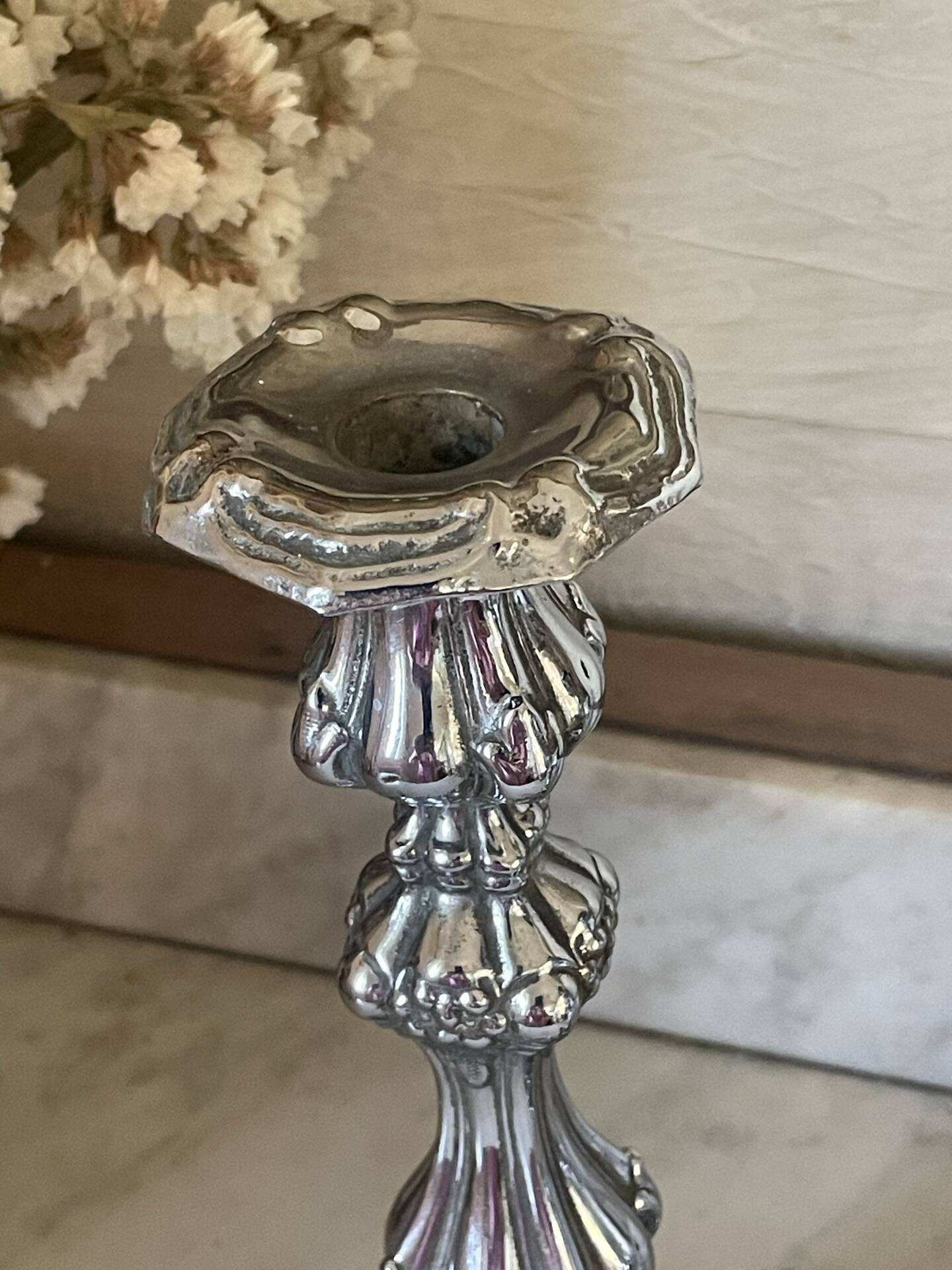 Pair of rococo silver-plated candlesticks