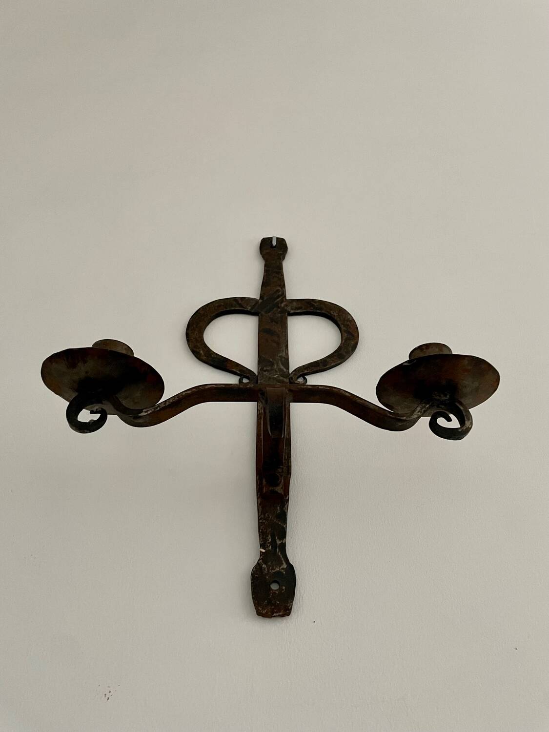 Brutalist wrought iron wall candle holder