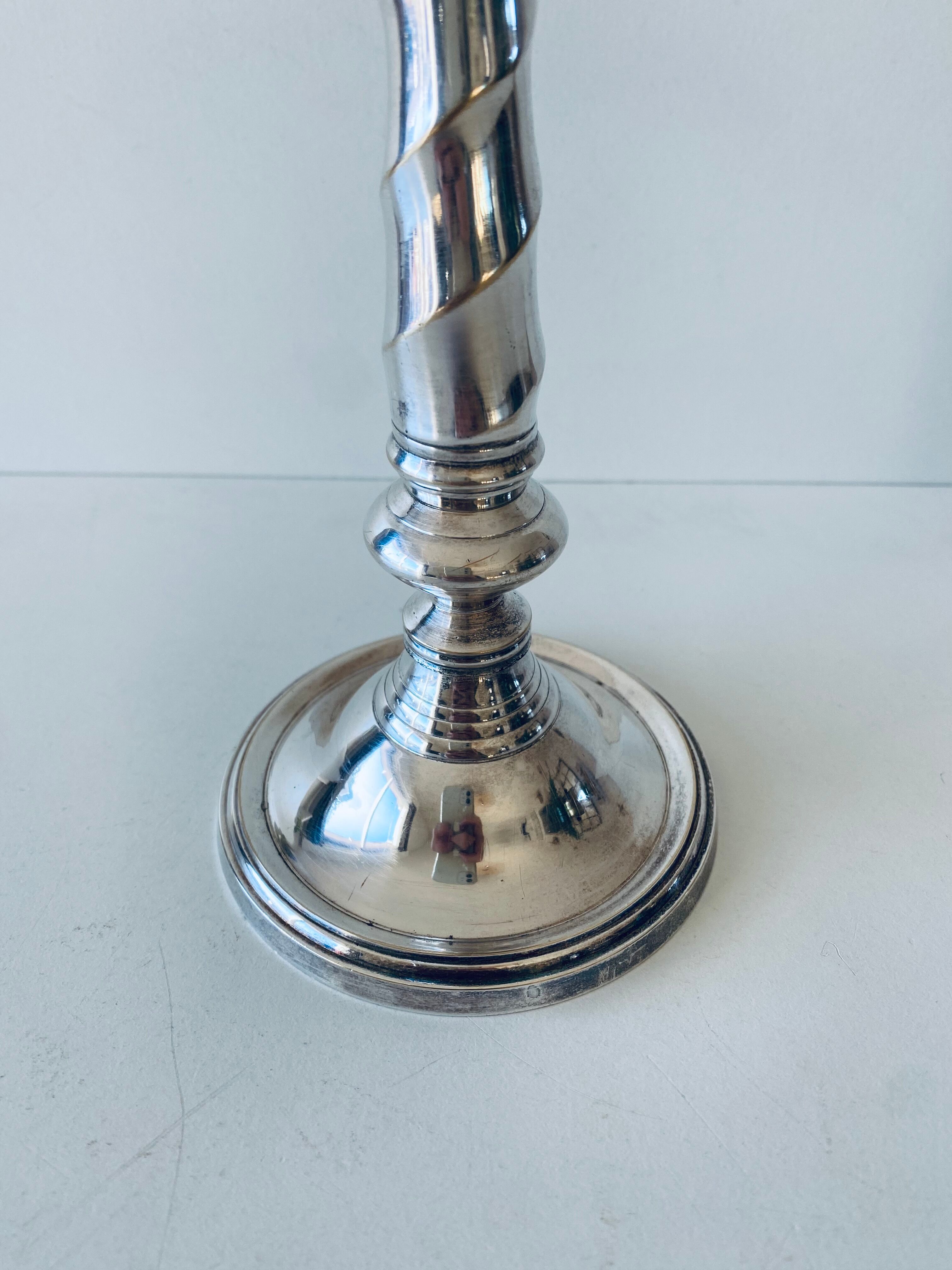Twisted silver candle holder