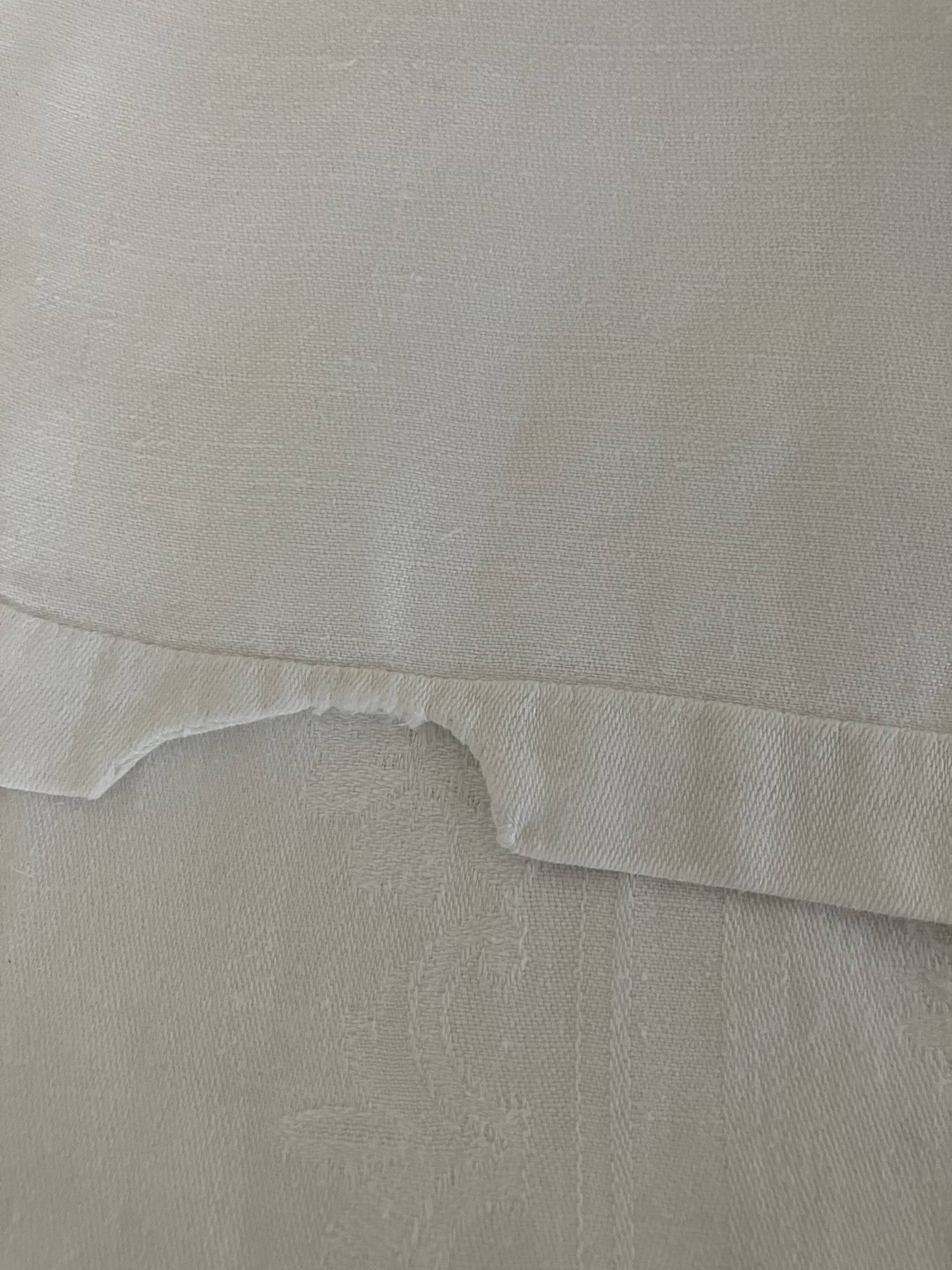 Nappe damassée, double monogramme
