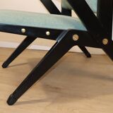 Vintage armchair from the 1960s in black wood and fabric.