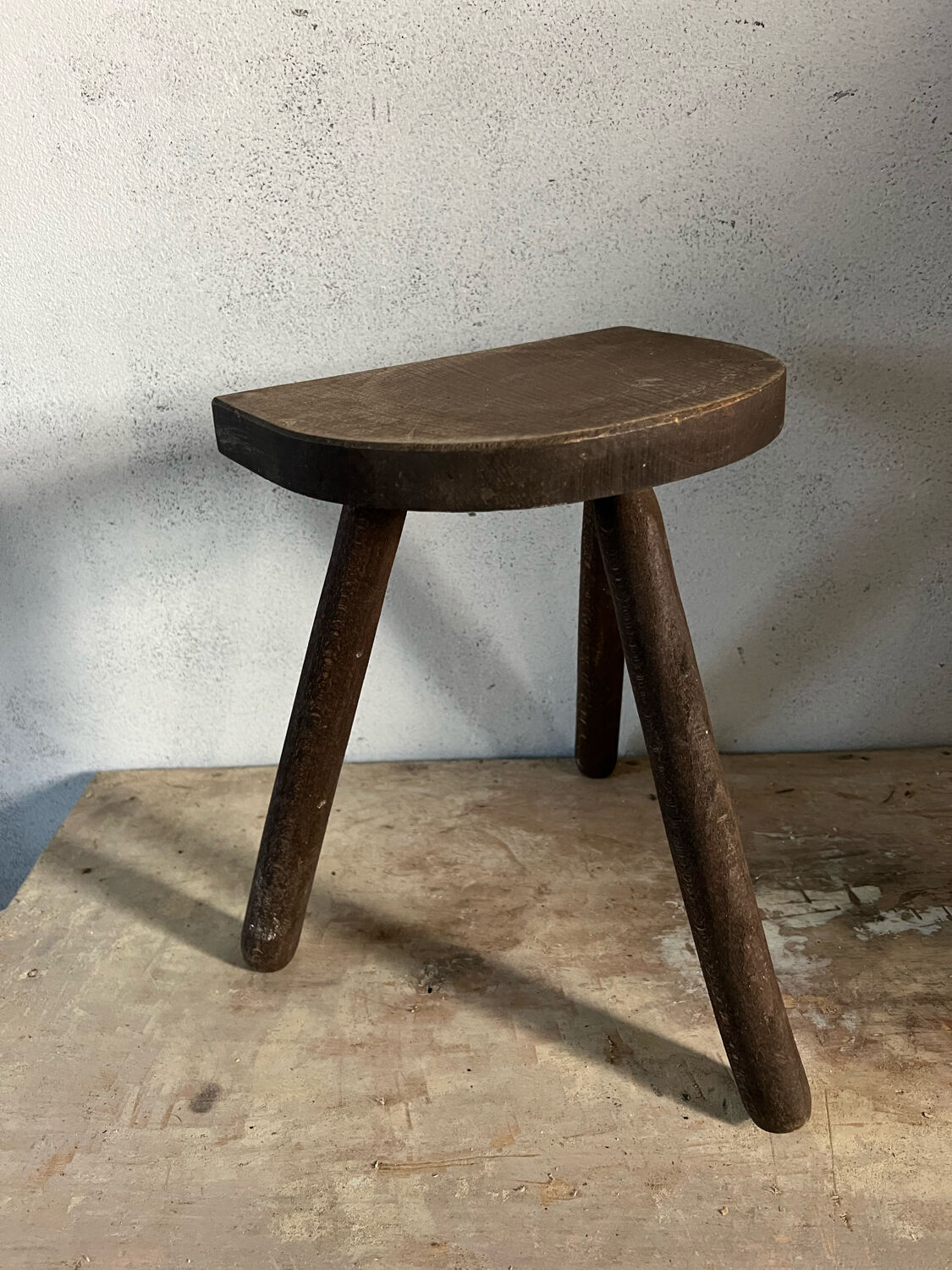 Wooden tripod stool