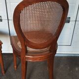 Pair of Louis XVI caned medallion chairs