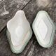 Sausage and porcelain ramekin