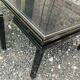Vintage metal coffee table with glass top.