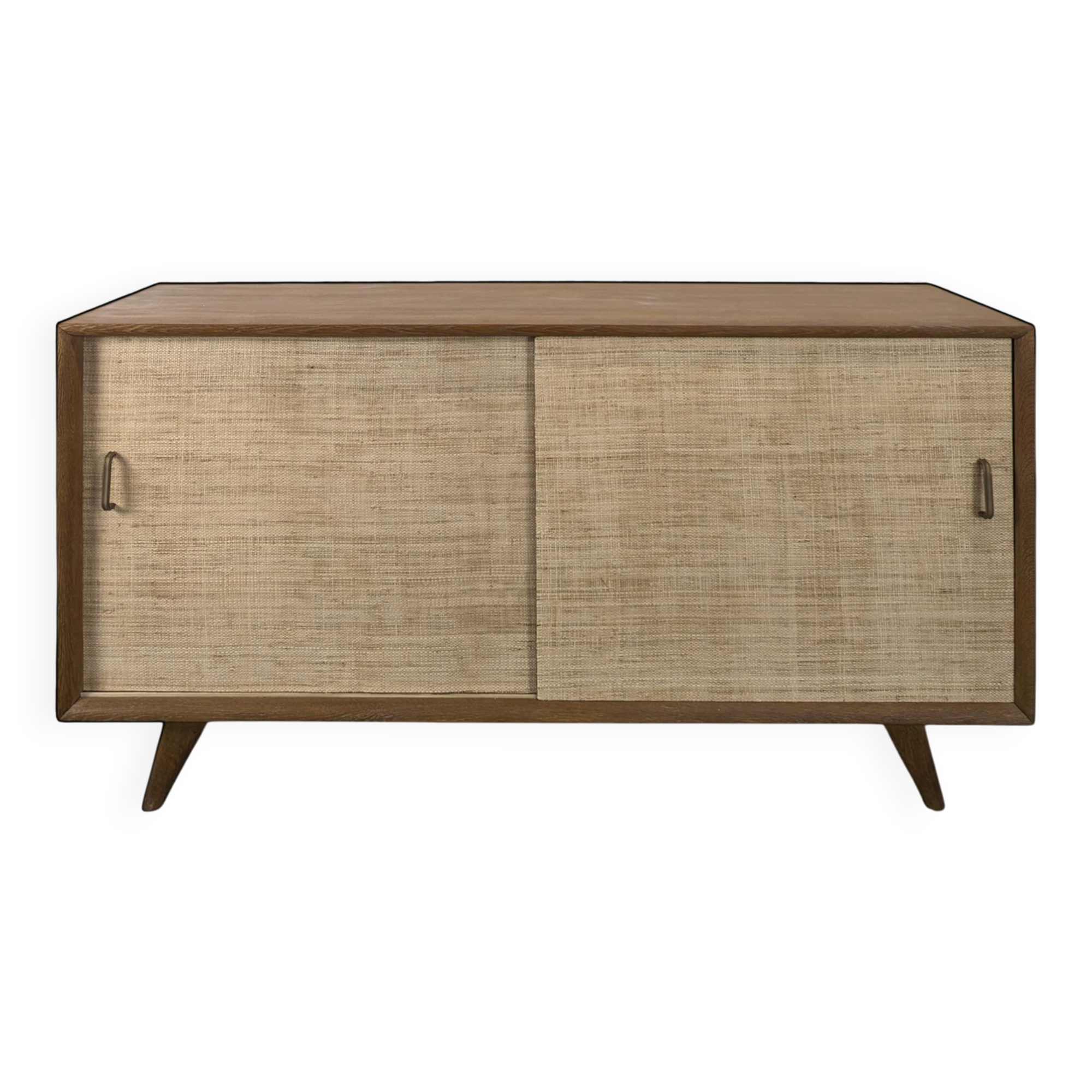 Modernist sideboard in oak with rattan doors.