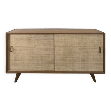 Modernist sideboard in oak with rattan doors.