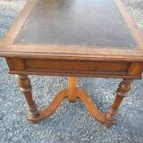 Old flat desk with brown leather top