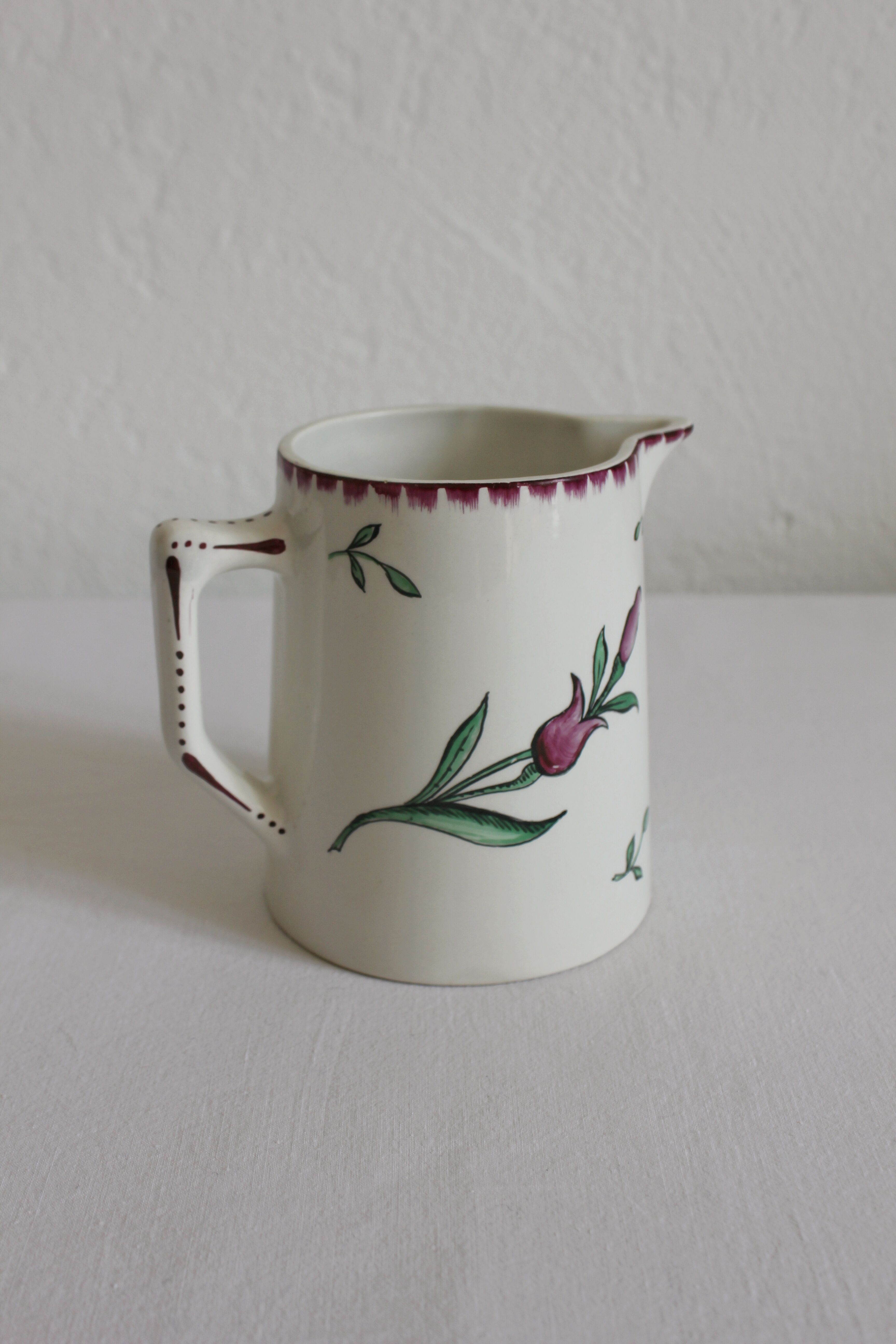 Earthenware jug with floral decoration from Digoin Sarreguemines.