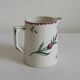 Earthenware jug with floral decoration from Digoin Sarreguemines.