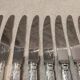 12 silver-plated metal table knives by the silversmith Ravinet Denfert, Empire style, model 81.