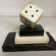A marble dice bookend
