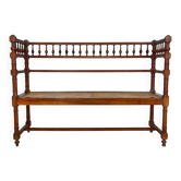 Antique banquette in Louis XIII style, turned wood with caning, late 19th to early 20th century.