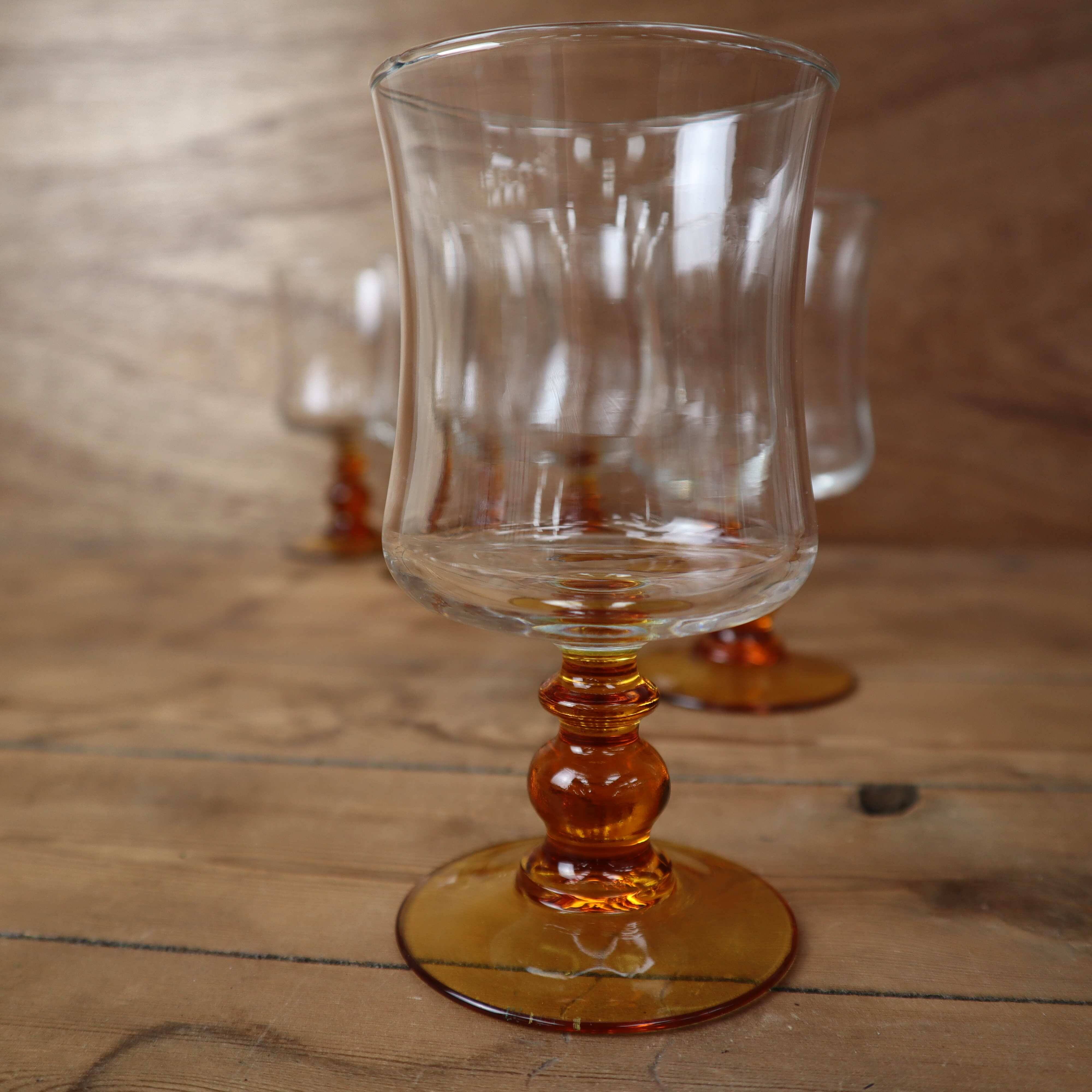 6 Luminarc "Antique" amber-stemmed water glasses