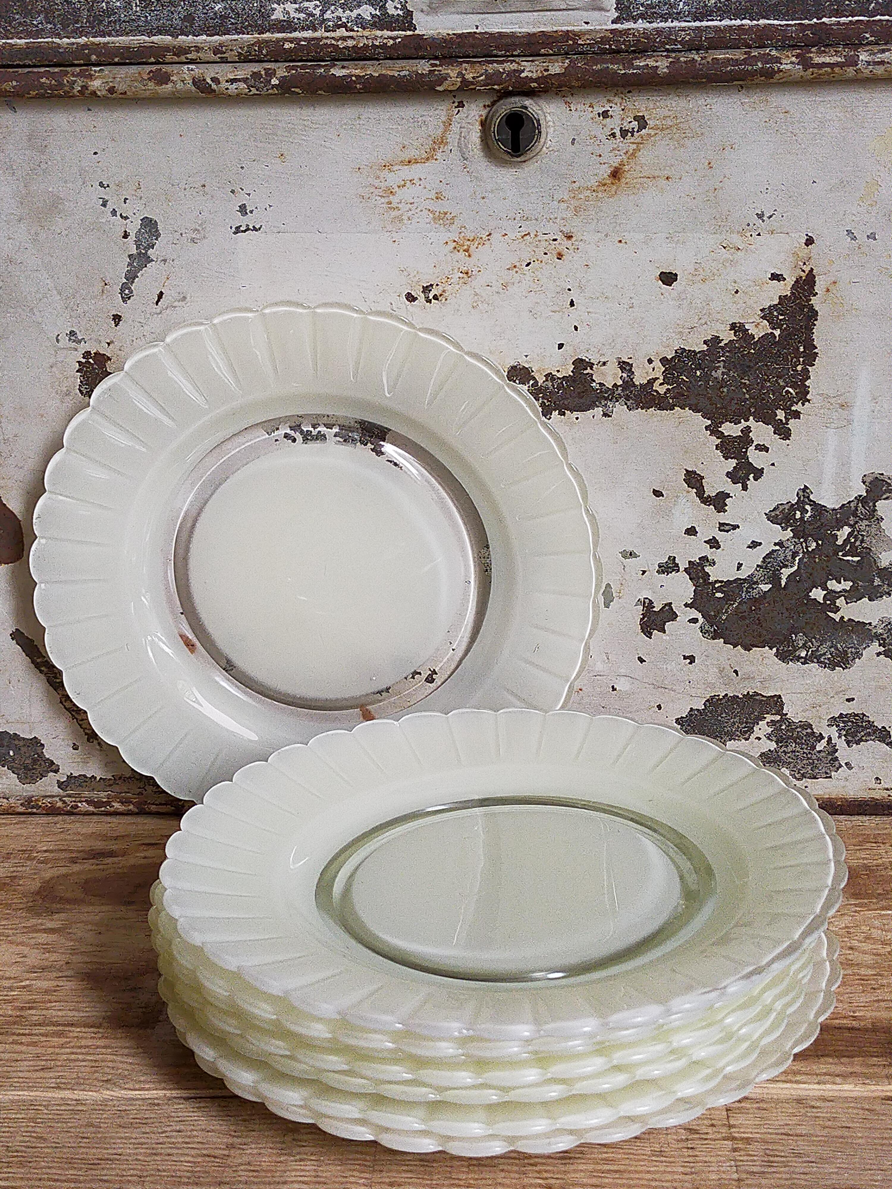 Eight Duralex dessert plates in 60s painted glass
