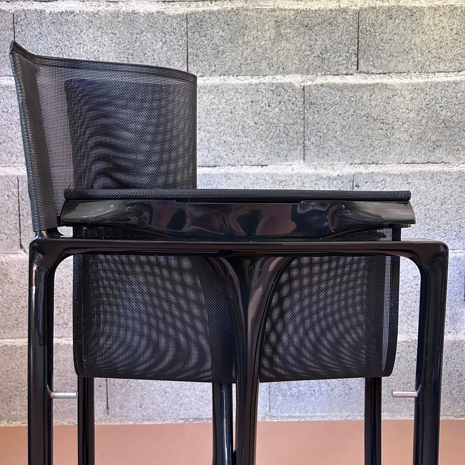 Shiny black folding chair Regista