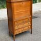 Secretary with drop-leaf in Louis XVI style, made of solid wood and brass, desk/commode.