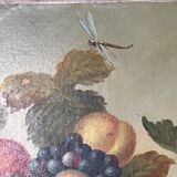 Still life painting of grapes and apples.