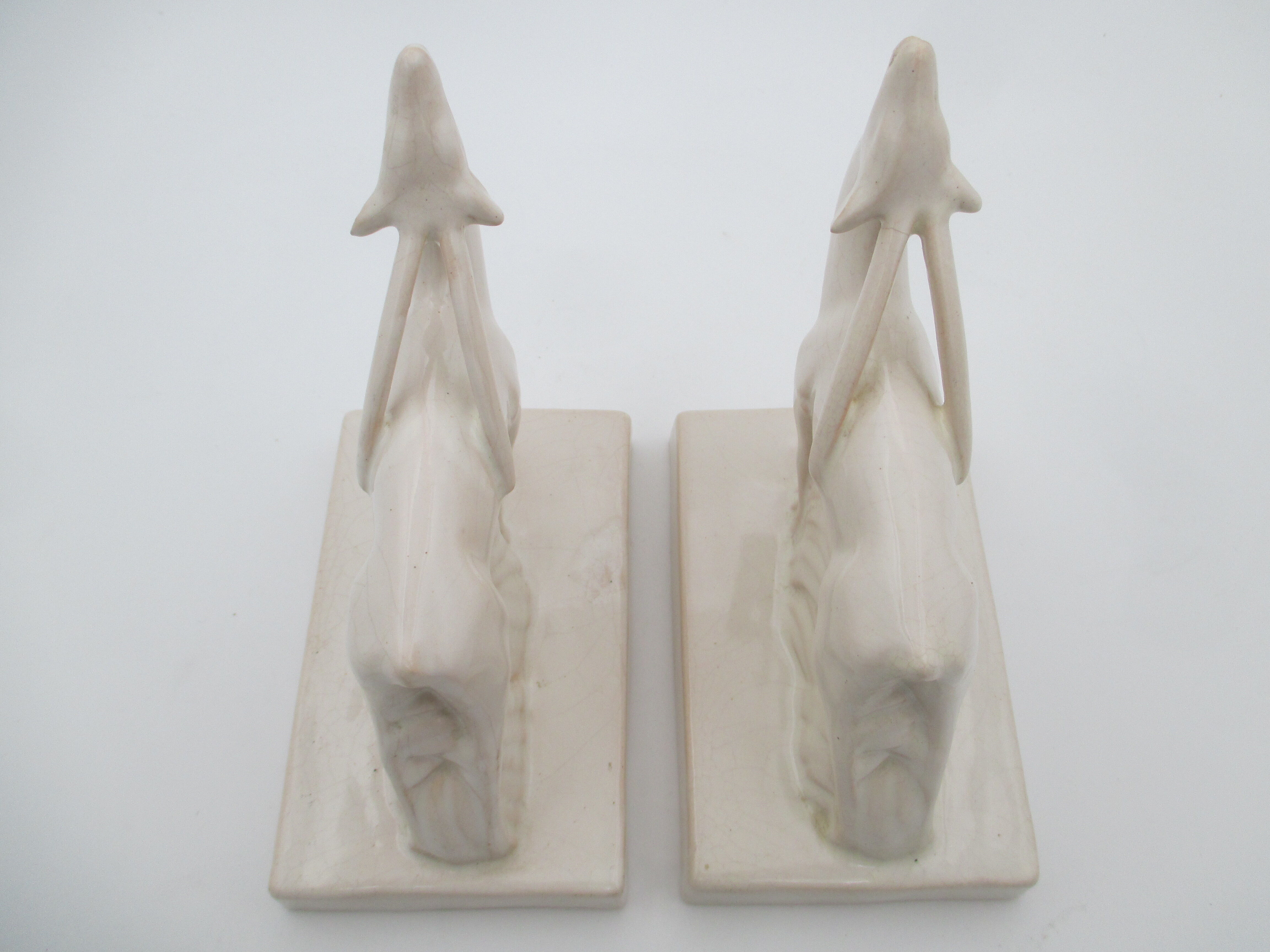 Greenhouse books ceramic cracked Antilopes signed Henri Delcourt art deco