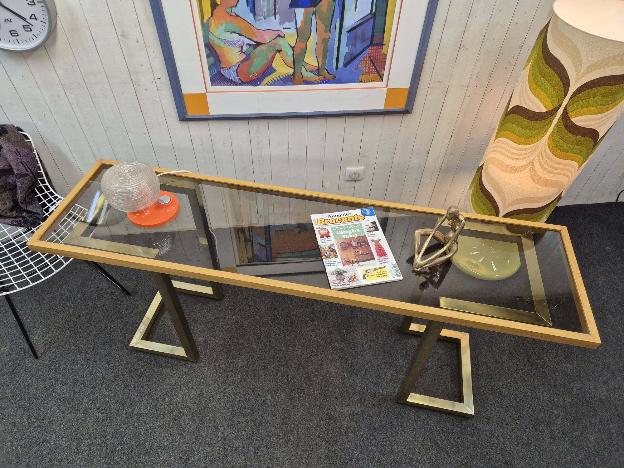 Vintage brass and smoked glass console.