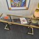 Vintage brass and smoked glass console.