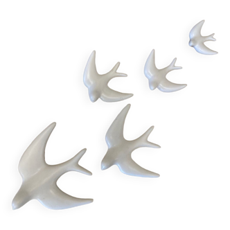 A series of ceramic birds