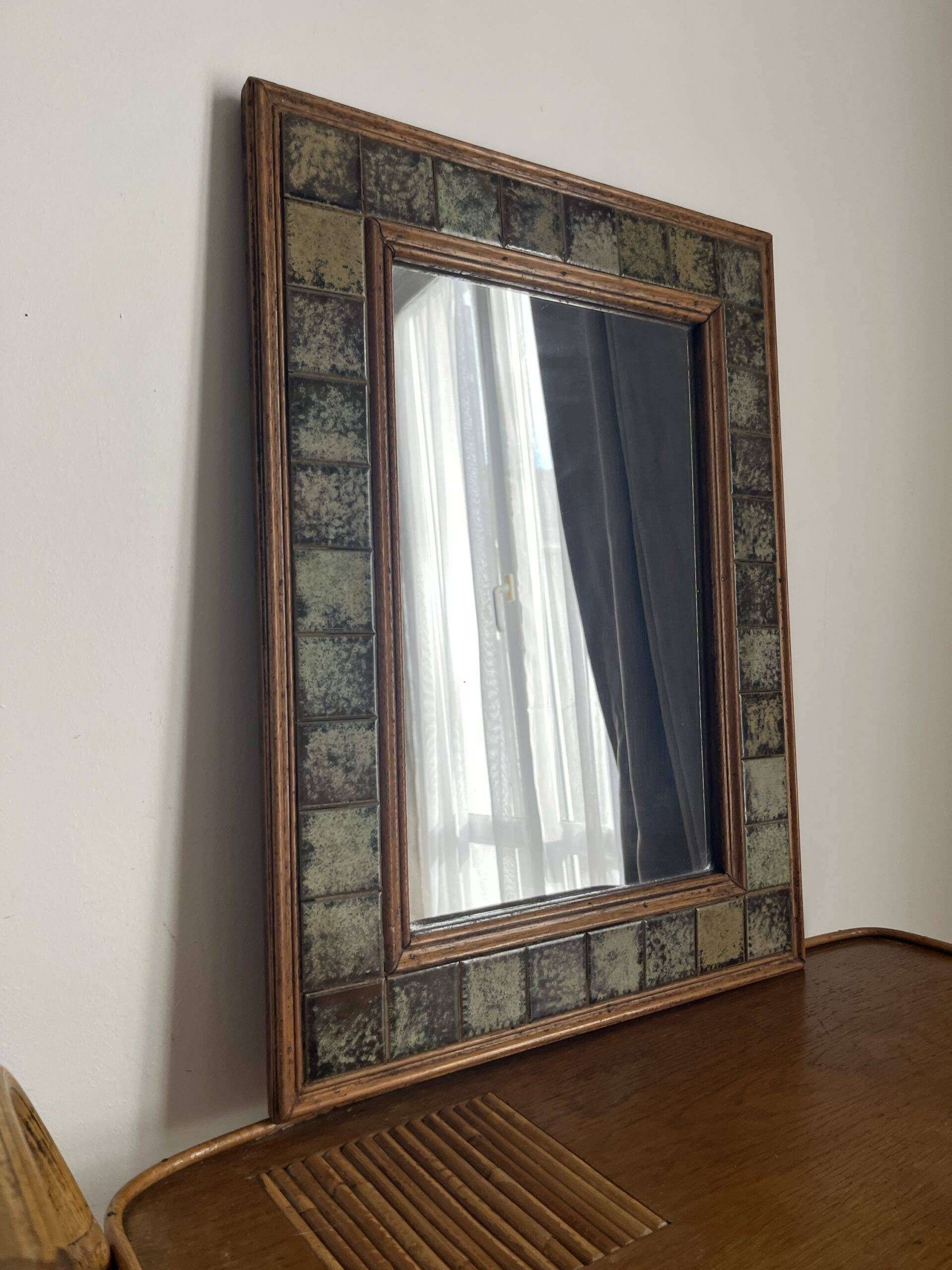 Vintage wall mirror in wood and ceramic tiles