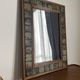 Vintage wall mirror in wood and ceramic tiles