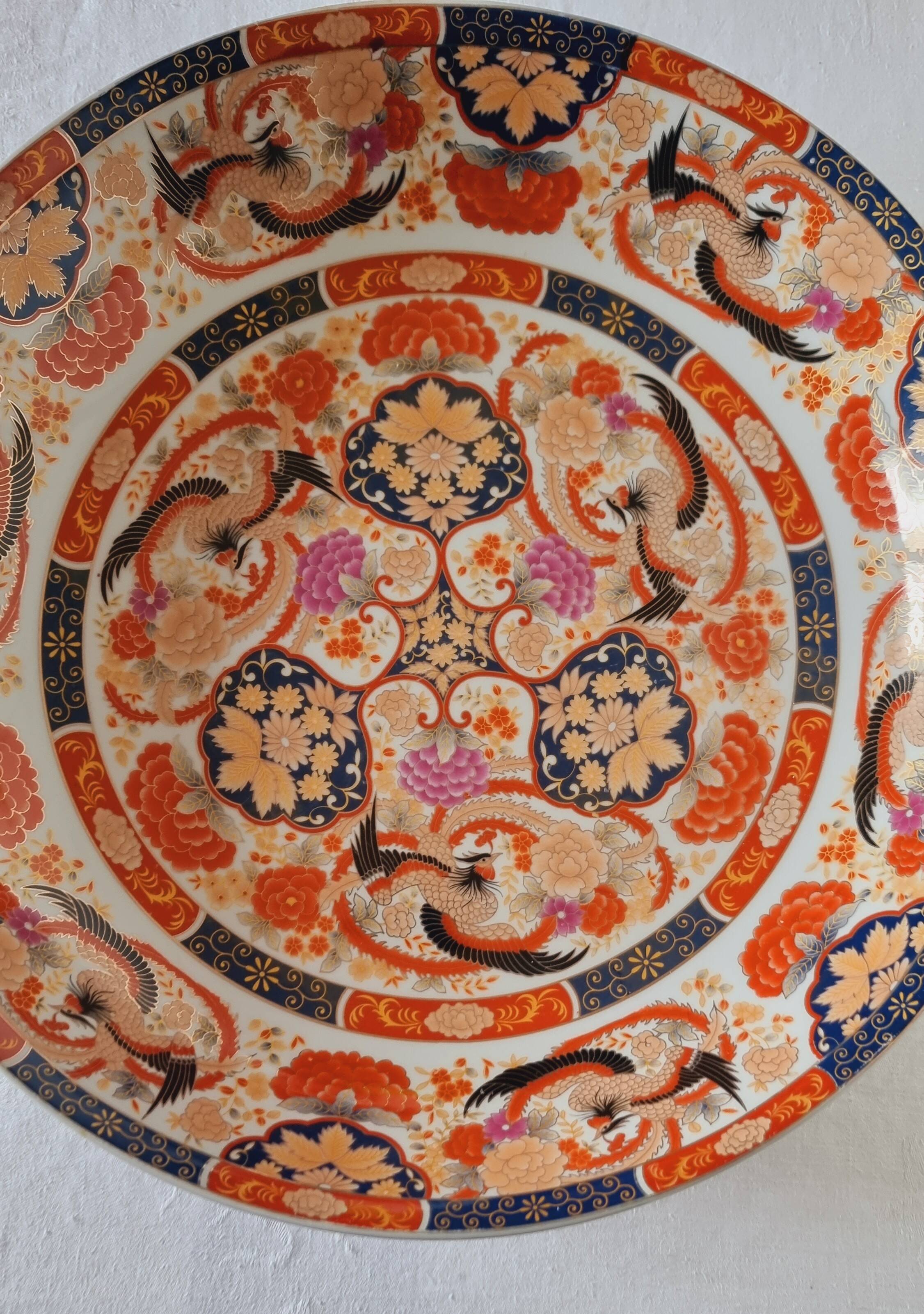 Large deep porcelain plate in Imari style (35.5 cm) with "Phe" decoration.