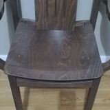 Paire de fauteuils Baumann en hêtre teinté modèle "Argos"