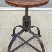 Bienaise stool of the years 1935, model 203 with 4 flat iron cathedral legs joined by a