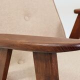 Mid-century modern armchair in camel wool with oak wood.