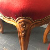 Old foot rest, red velvet