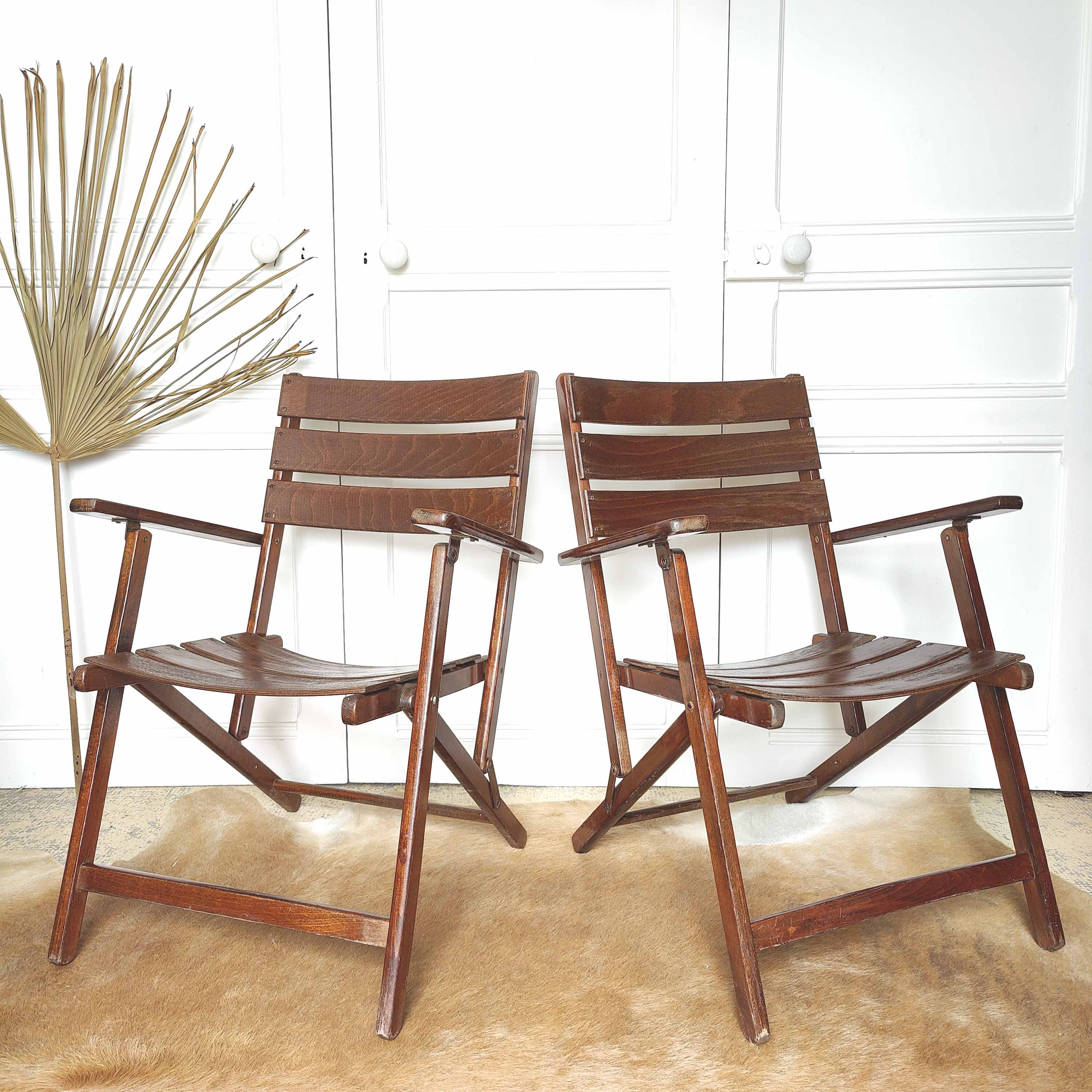 Pair of folding wooden armchairs