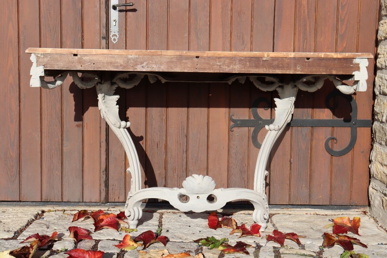 Carved wooden console
